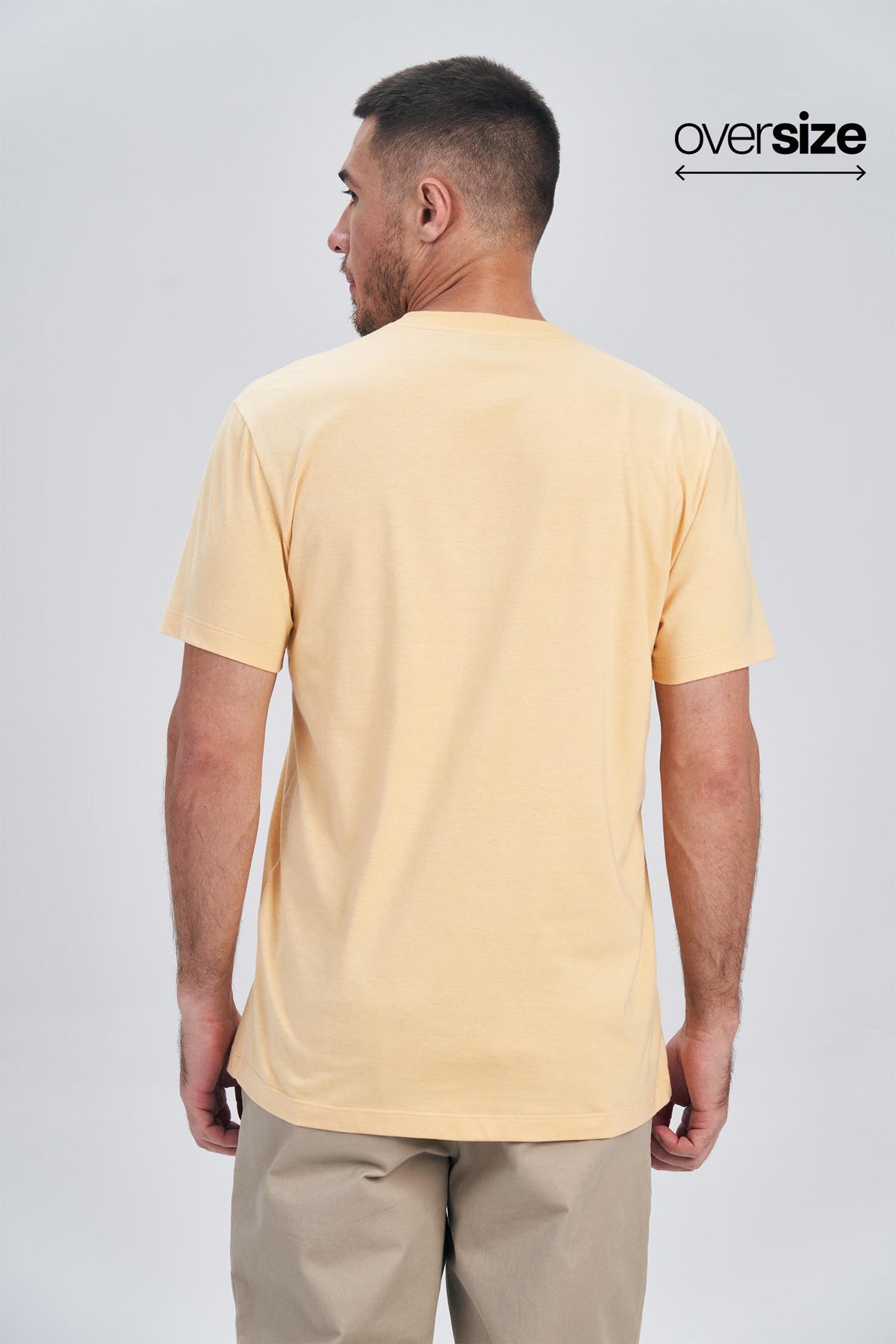 Camiseta Discover The World Masculina Oversize Acostamento Amarelo Creme